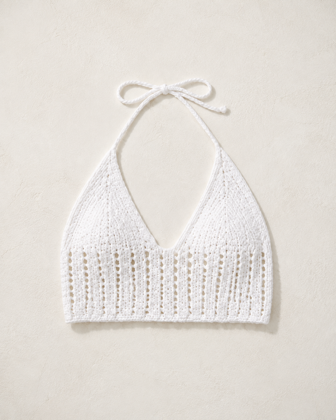 White crochet knit halter top, flat lay, full garment shown