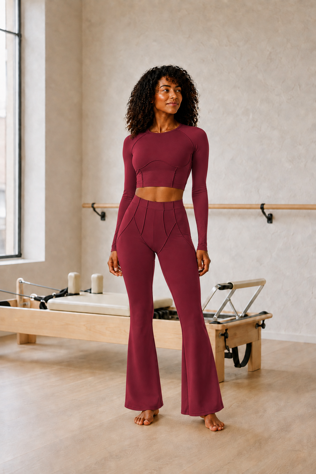 Burgundy Long-Sleeve Seamed Crop Top and High-Waist Flare Pants Set front view on model