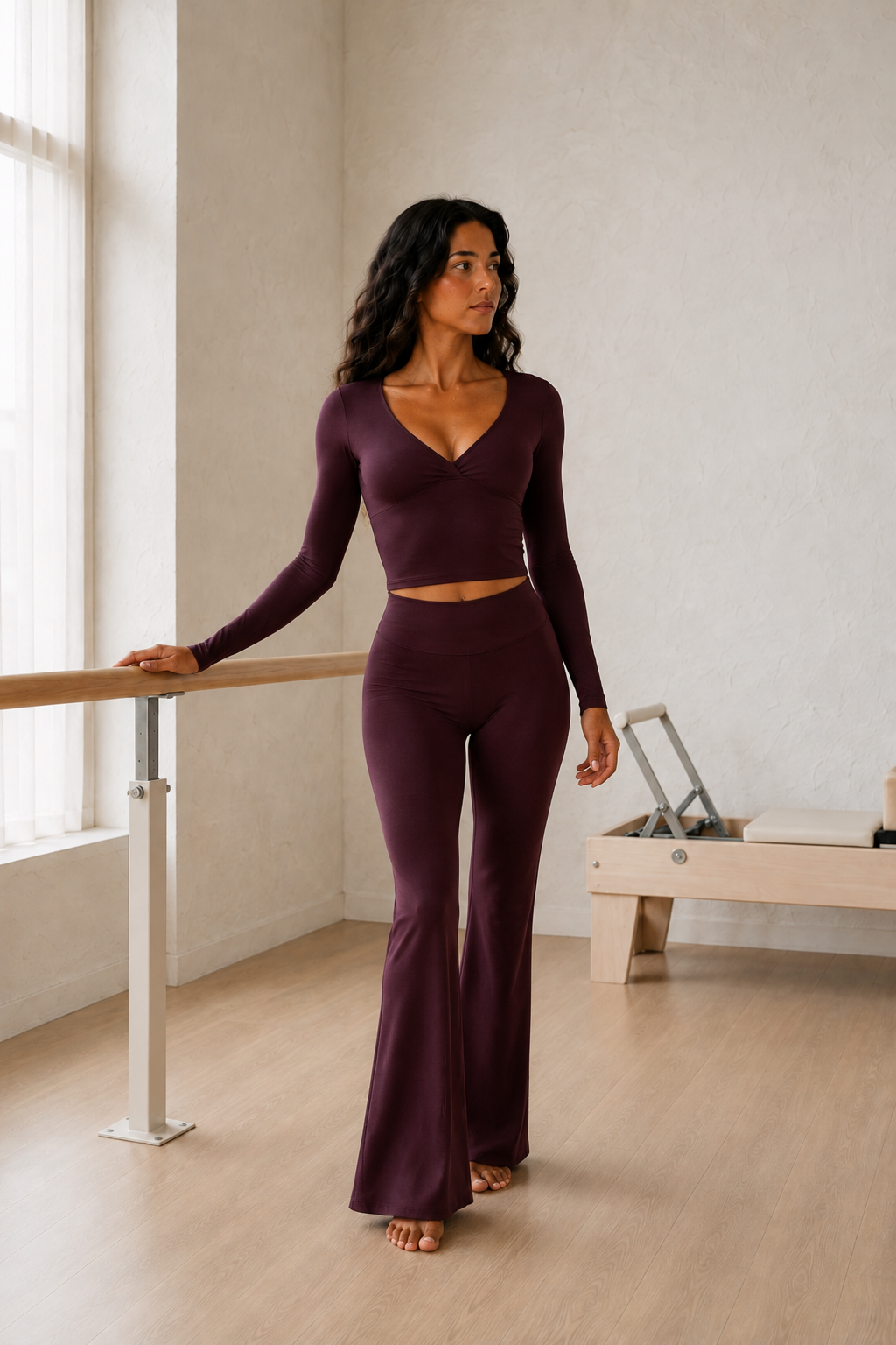 Burgundy Ruched V-Neck Crop Top and Flare Pants Set front view on model