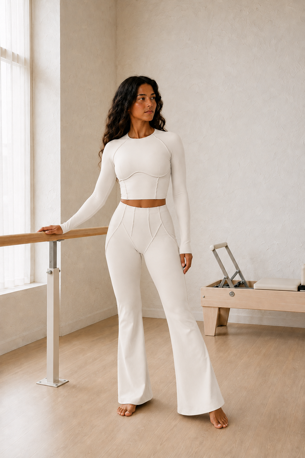 Ivory Long-Sleeve Seamed Crop Top and High-Waist Flare Pants Set front view on model