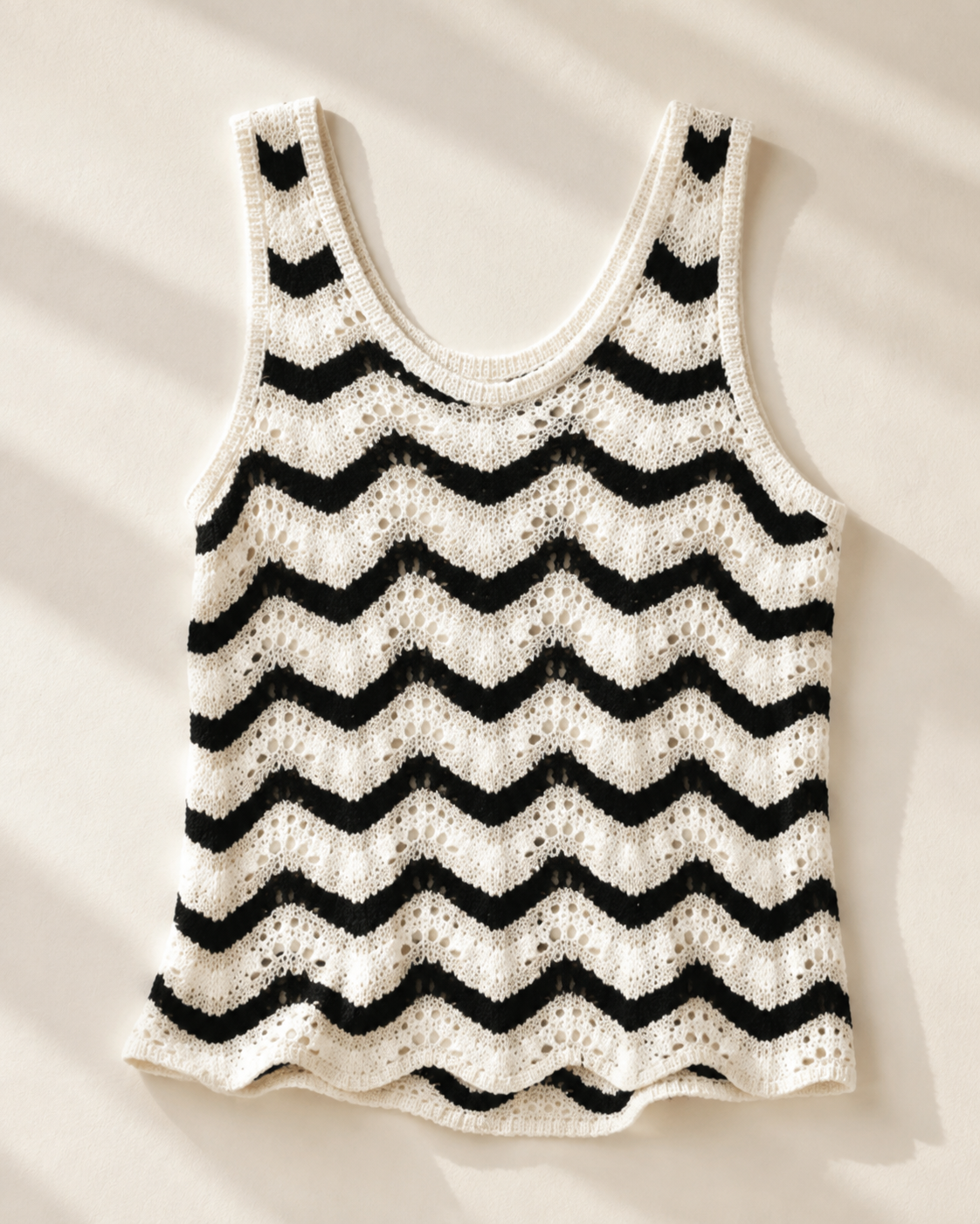 Black and white chevron knit tank top, studio view, full garment shown