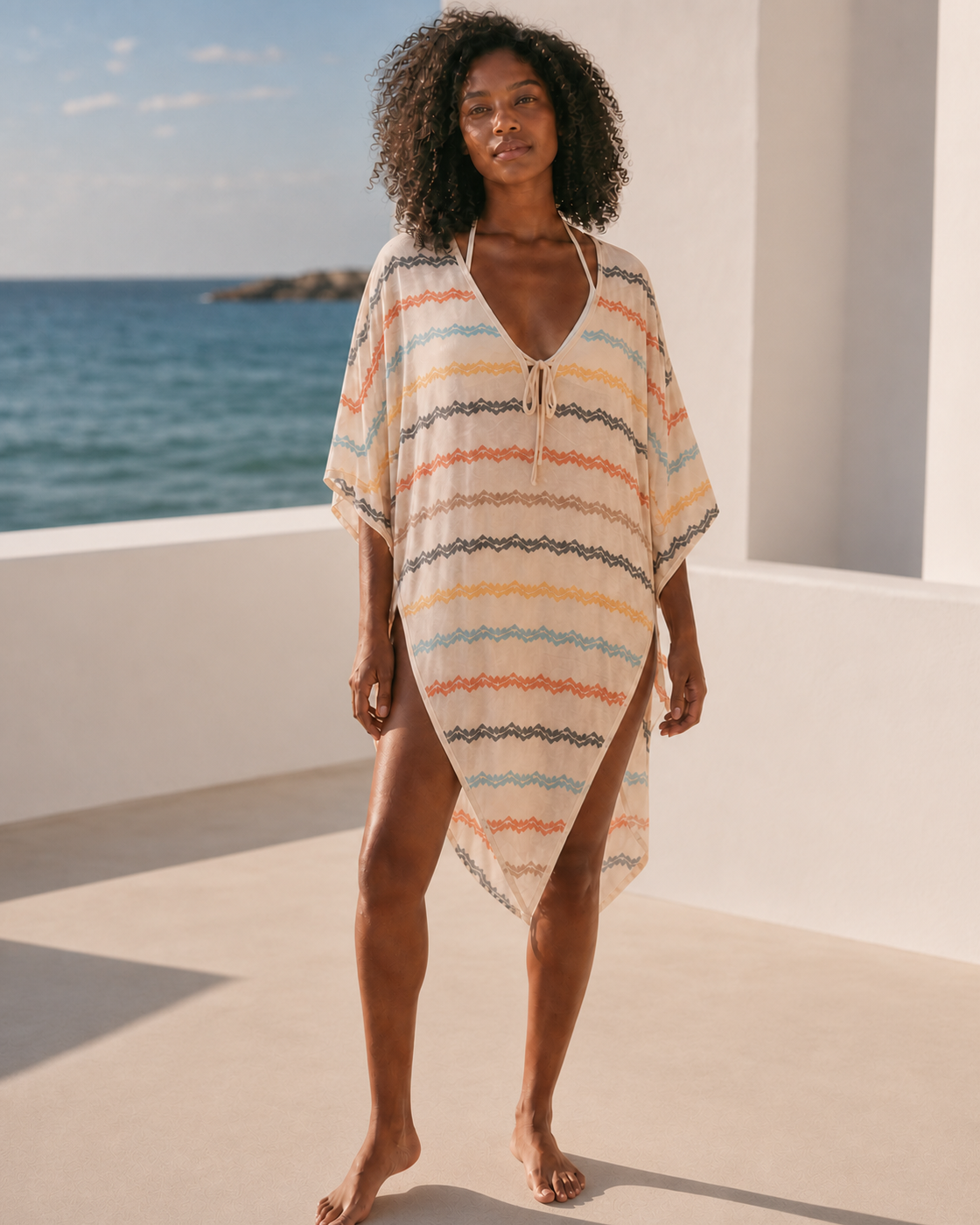 Cream kaftan, front view on a third model