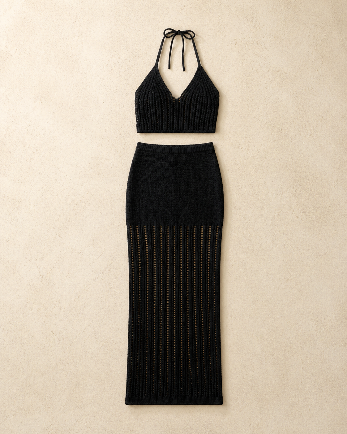 Black crochet knit halter top and maxi skirt set, studio flat lay