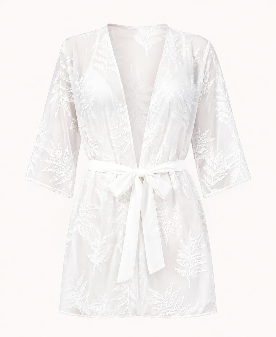 White belted kimono cover-up detail showing the open front, three-quarter sleeves, belt, and botanical print.
