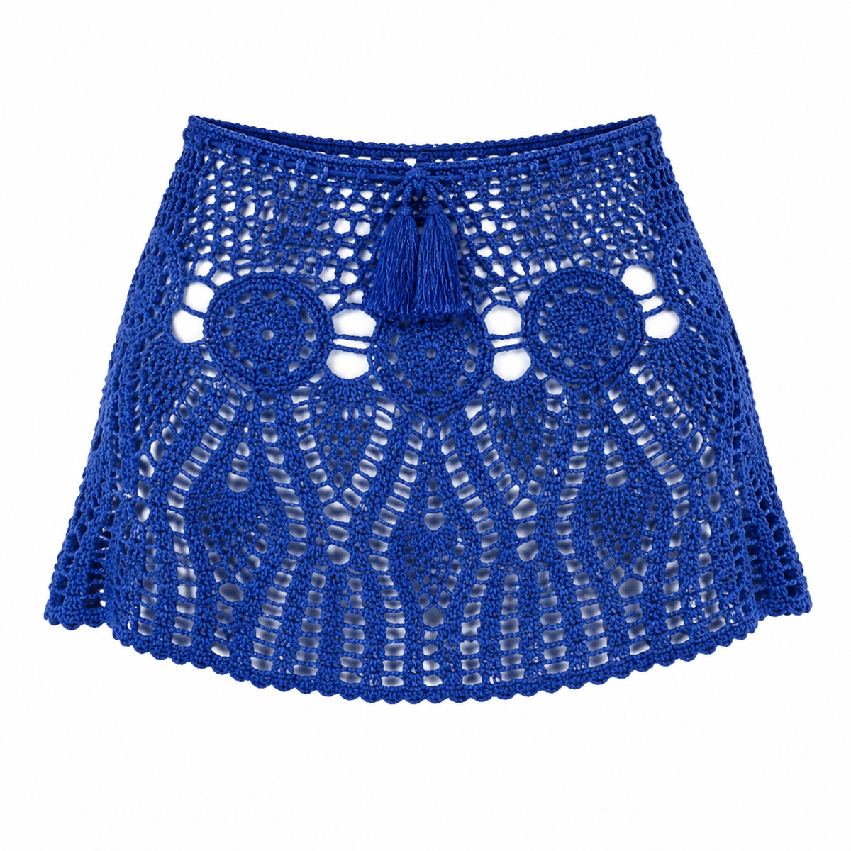 Royal cobalt blue crochet mini skirt detail showing the front tie, circular motifs, openwork, and scalloped hem.