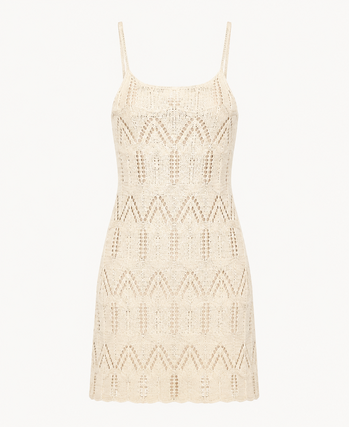Cream-beige crochet cami mini dress detail showing repeating chevron bands, thin straps, and short hem.
