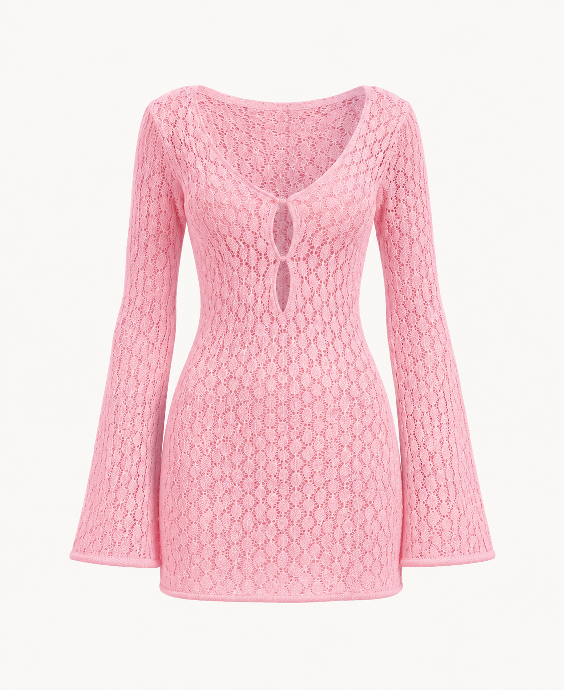 Pink openwork crochet mini dress detail showing two vertically aligned front openings and sleeves that widen toward the cuffs.