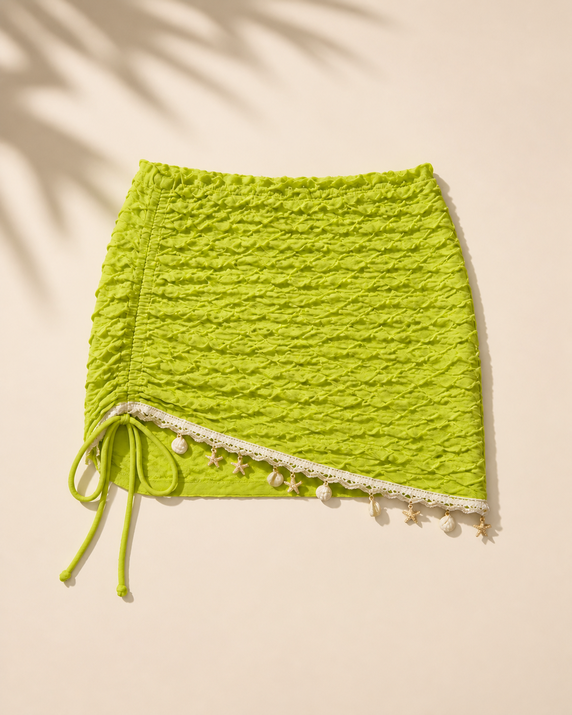 Lime Green Ruched Mini Skirt Swim Cover-Up with Shell Trim, studio flat lay view