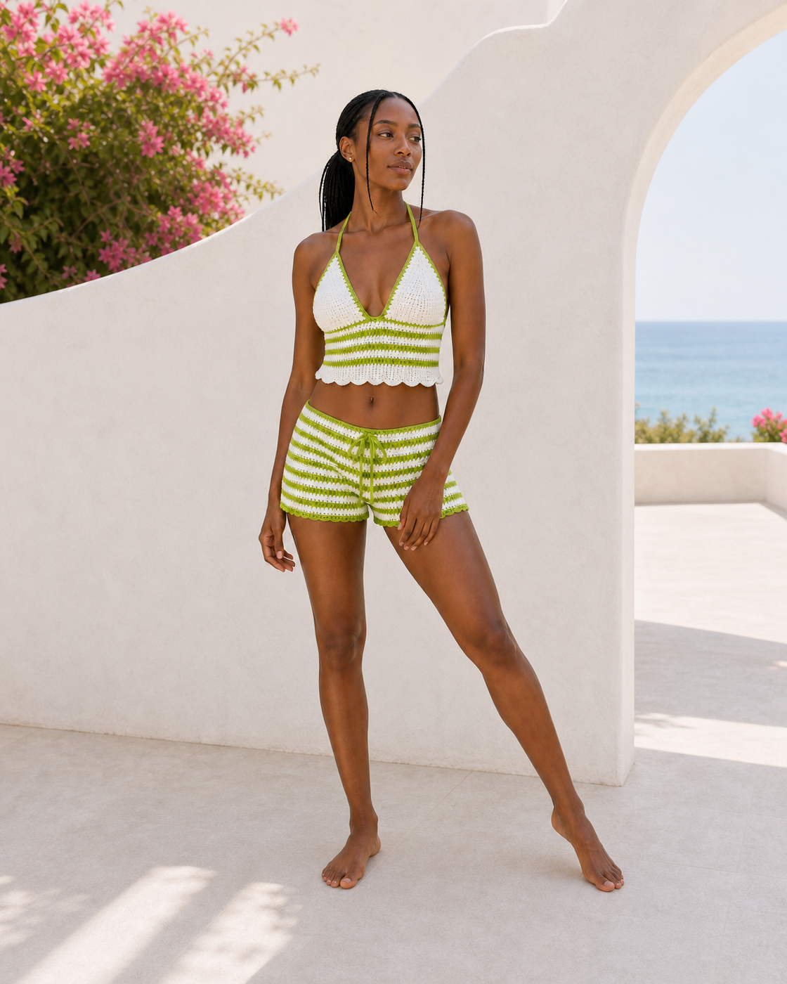 Green crochet halter top, front view on a third model