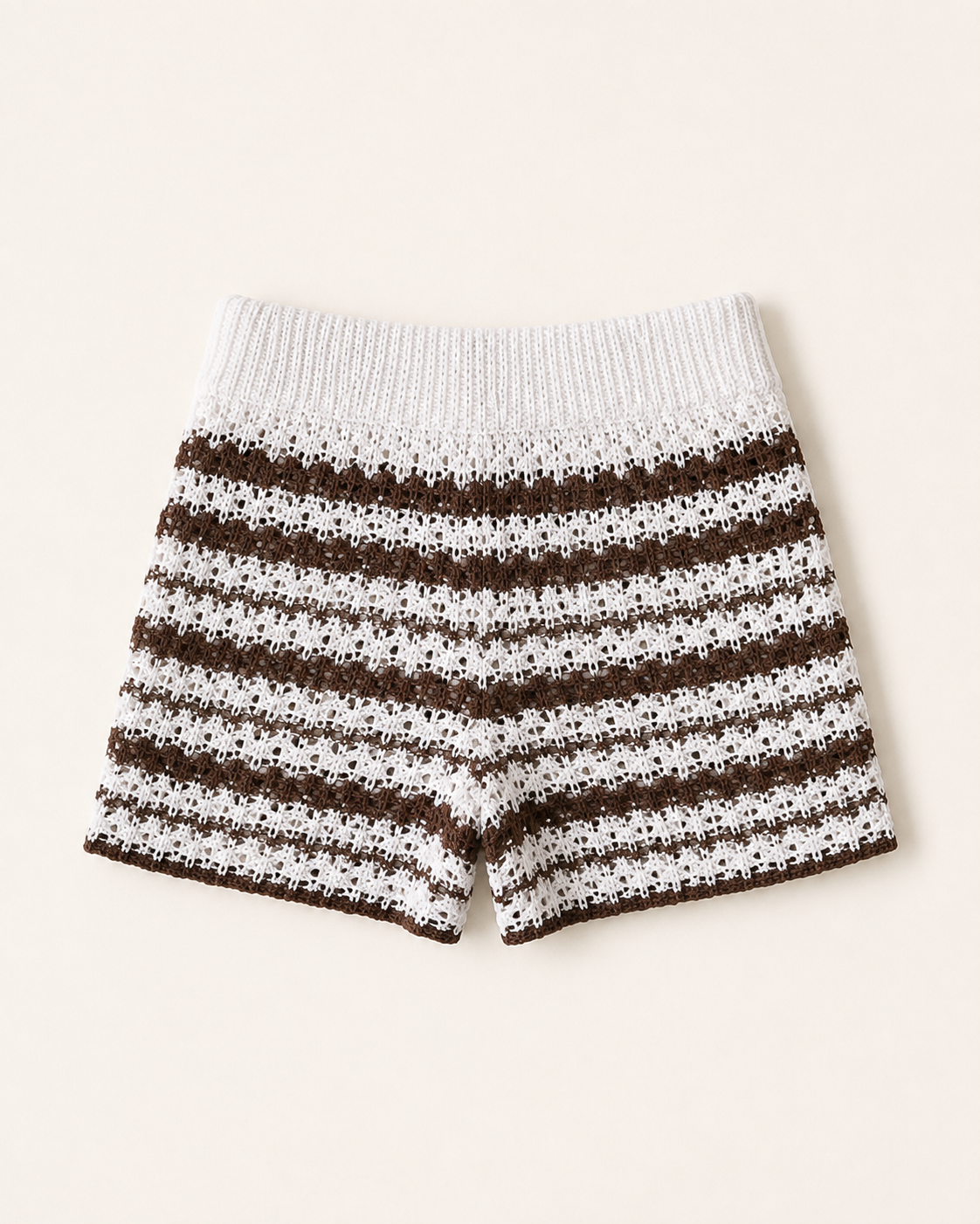 White and brown striped knit shorts with a white waistband, standalone studio view