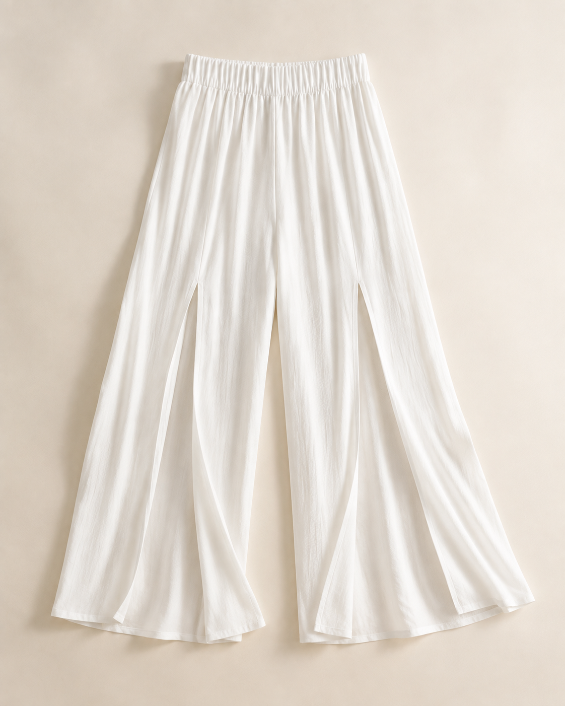 White wide-leg pants with two high front slits, studio view